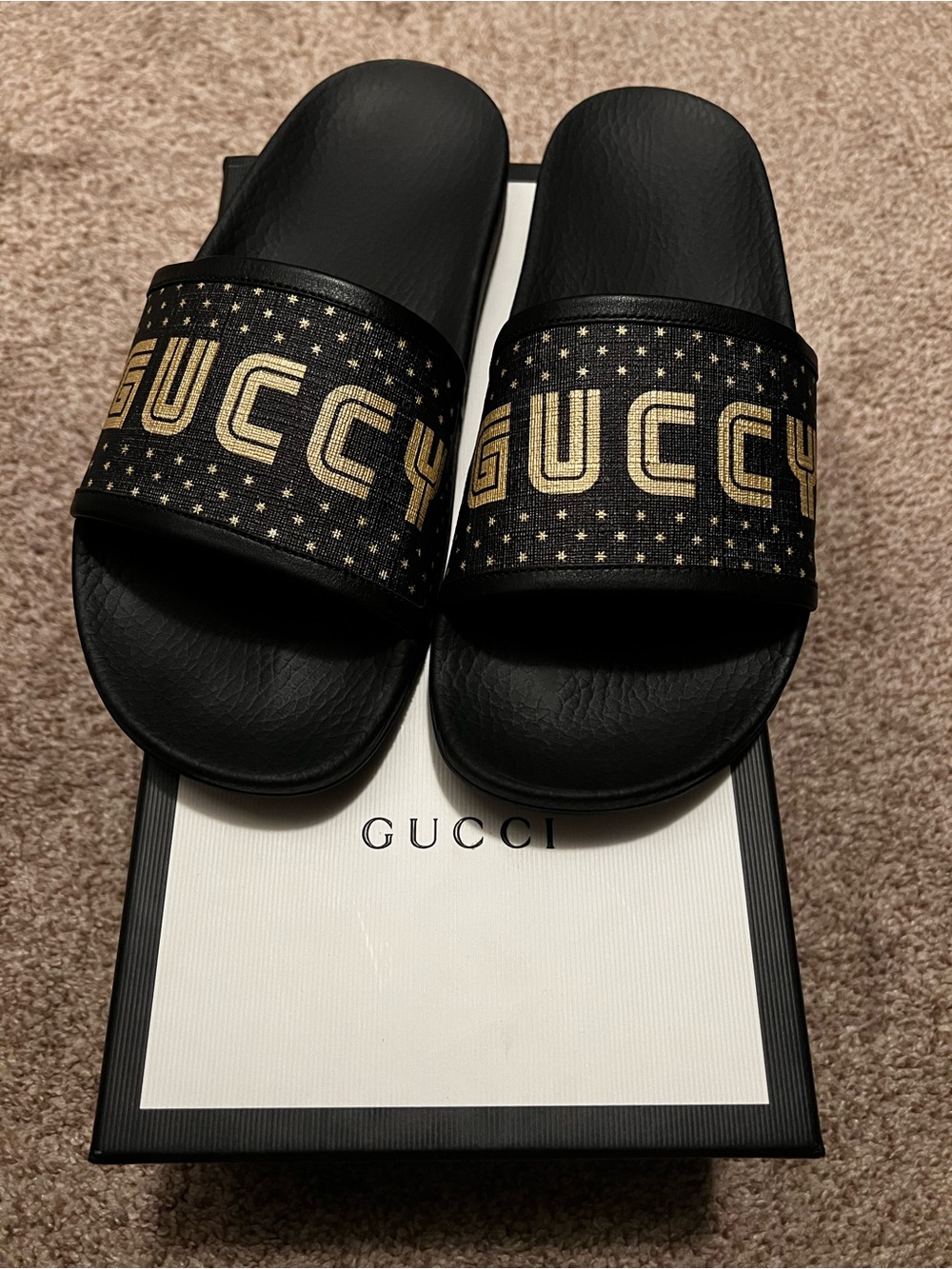Women’s Gucci Black Slides with Gold Logo Stars